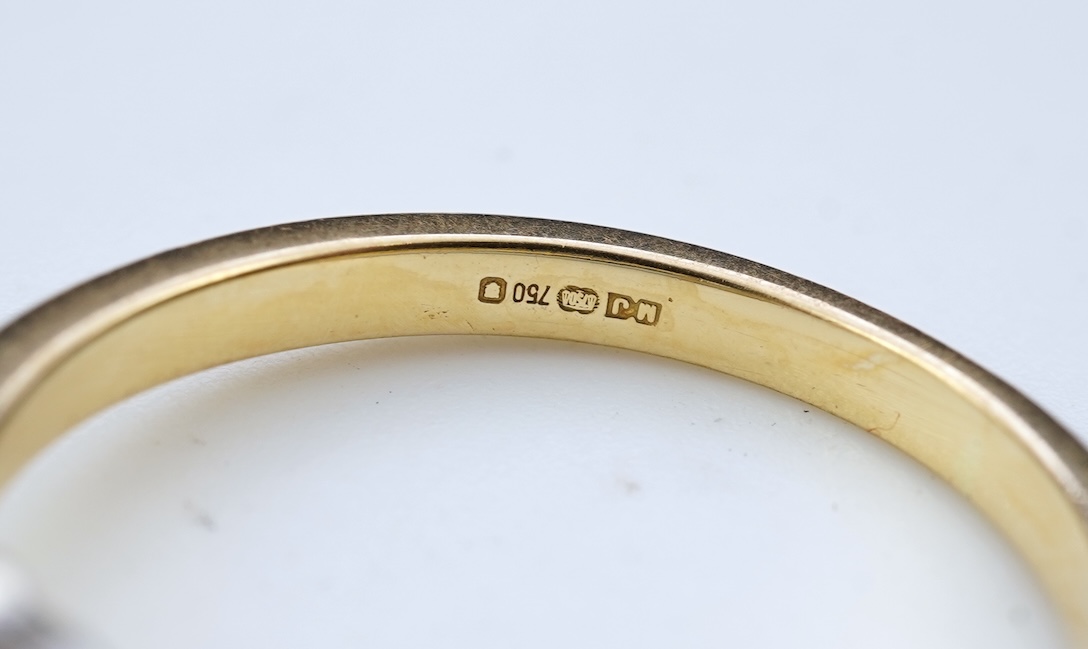 A diamond solitaire ring